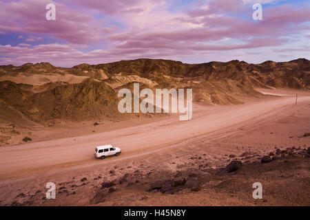 Africa, Namibia, Namib Naukluft National Park, stone desert, road, off-road vehicle, evening mood, Stock Photo