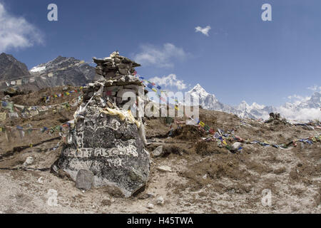 Nepal, Solo Khumbu, Thokla Pass, memorial stone Scott Fisher, background Ama Dablam, Stock Photo