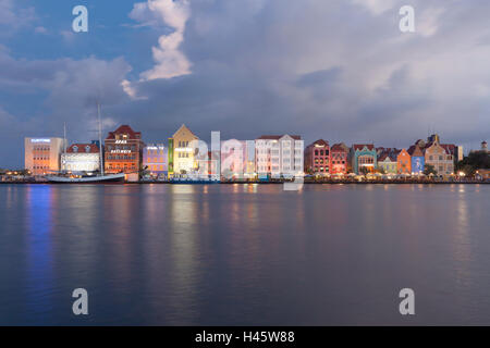 Colorful houses at Handelskade, Willemstad, Curacao, at night. Long Exposure shot. Stock Photo