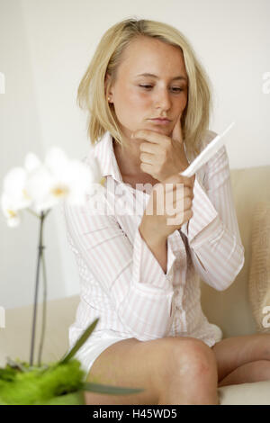 Woman, young, blond, pregnancy test, thoughtful, Stock Photo
