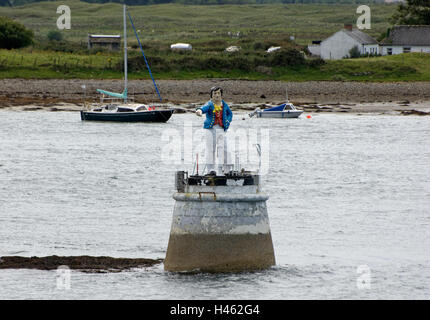 THE METAL MAN LIGHTHOUSE, ROSSES POINT, OYSTER ISLAND, CONEY ISLAND, COUNTY SLIGO, IRELAND. ROSSES POINT IS WHERE POET, DRAMATIST AND NOBEL PRIZE WINNER IN LITERATURE, WILLIAM BUTLER YEATS AND HIS BROTHER PAINTER JACK YEATS SPENT THEIR SUMMER HOLIDAYS Stock Photo