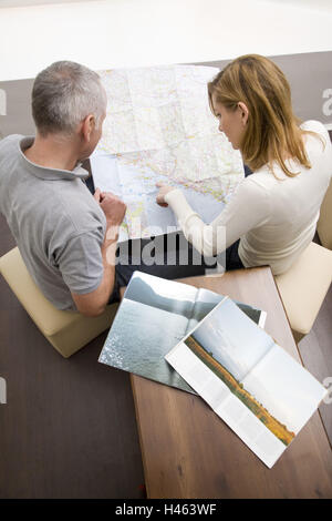 The man planning his vacation trip with map Stock Photo - Alamy