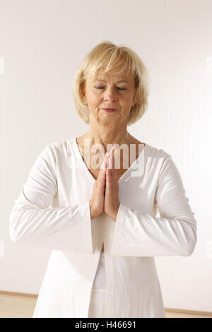 Senior, yoga practise, half portrait, Stock Photo