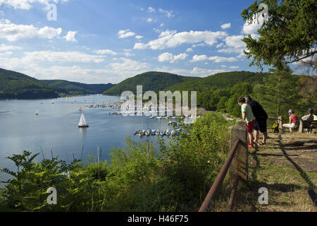 Germany, Hessen, Northern Hessen, Edersee, summer evening, evening sun, lookout, marina Rehbach, cyclists, tourists, Stock Photo