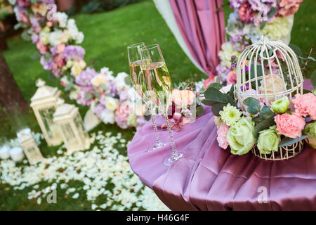 Wedding glasses with champagne at the ceremony Stock Photo