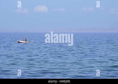 Venezuelan lone fisherman. Gulf of Cariaco, Cumana, Sucre state, Venezuela. Stock Photo