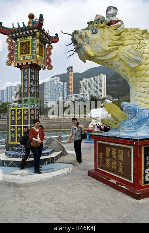 China, Hong Kong, Hong Kong Iceland, Repulse Bay, high rises, Tin Han temples, statue, dragon, visitor, no model release, Stock Photo