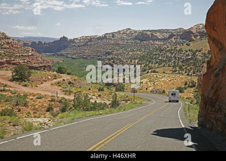 The USA, Utah, highway, Escalante, Boulder, street, camper, scenery, bushes, trees, meadows, mountains, rocks, red, valley, nature, on the way, to travel, tour, vacation, tourism, left turn, America, Stock Photo