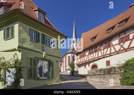 Parish Church of St. Sebastian and wineries Häusle in Sulzfeld, Lower Franconia, Bavaria, Germany Stock Photo