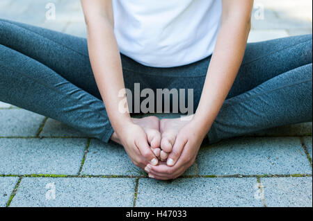 Woman doing yoga exercises Stock Photo