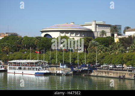 Spain, Andalusia, Seville, view over Rio Guadalquivir on the Paseo de Cristobal Colon with bullfight arena, Stock Photo