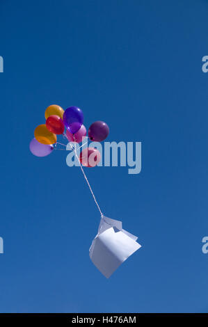 blue sky, balloons with embassies, Stock Photo