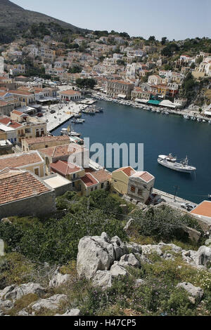 Greece, Dodekanes, Rhodes, island, Symi, hill, town overview, harbour place, Gialos, harbour, sea, view, view, local overview, overview, Simi, town, Symi town, island capital, houses, boots, ships, harbour promenade, Stock Photo