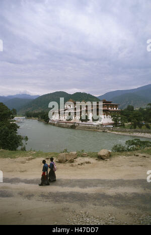 Bhutan, Punakha, cloister fortress Dzong, river, street, passer-by, scenery, Asia, the Himalayas, kingdom, Zentralbhutan, culture, Punakha-Dzong, cloister, cloister facility, cloister castle, fortress, structure, building, historically, architecture, reli Stock Photo