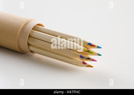 various coloured pencils in wooden container, Stock Photo