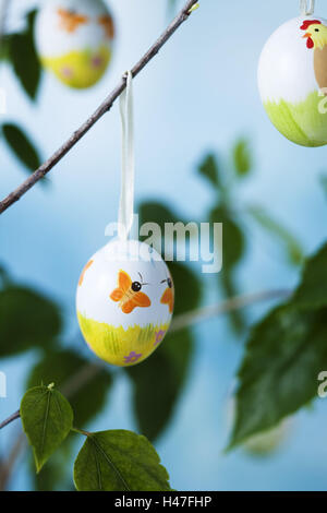 Painted Easter eggs hanging in twigs, Stock Photo