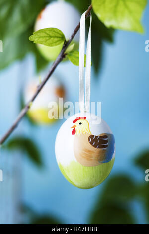 Painted Easter eggs hanging on branches, Stock Photo