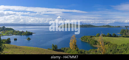 South America, Chile, Patagonia, lake Lago Llanquihue, place Puerto Octay, volcano Osorno, snowy summit, 2652 m, cloud cover, Stock Photo