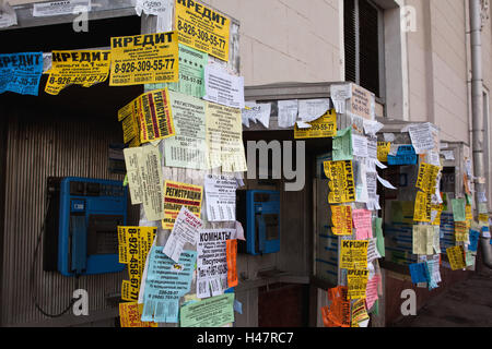 Moscow, slips of paper and messages at telephone boxes, Stock Photo