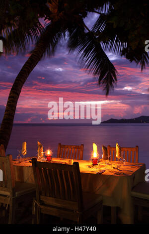 The Seychelles, evening mood, beach, covered table, palm, Stock Photo
