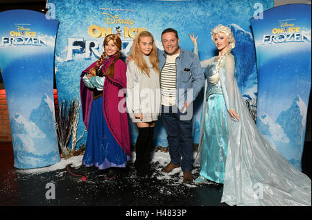 John Thomson and guest meet Anna and Elsa at the UK premiere of Disney On Ice presents Frozen in Manchester. Stock Photo