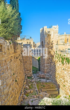 The deep moat of the King David's citadel with the small bridge, connecting it with the gate, Jerusalem, Israel. Stock Photo