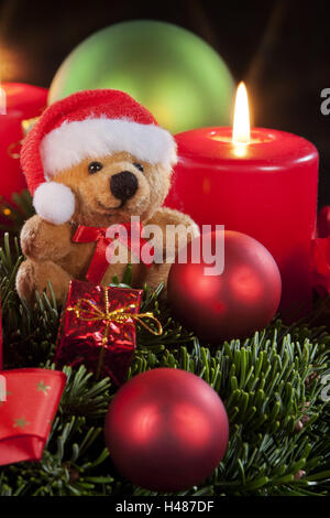Advent wreath, four burning skyers, teddy bear, medium close-up, Stock Photo