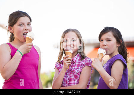 three friends eating ice cream, Stock Photo