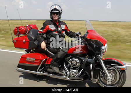 Motorcyclist, Harley Davidson, travel motorcycle, Supertourer, Stock Photo