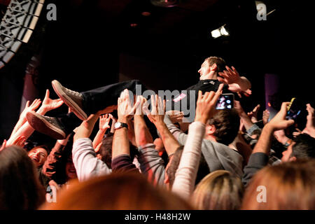 BARCELONA - MAR 18: The frontman of The Subways (rock band) performs with the crowd at Bikini stage. Stock Photo