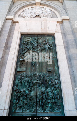 Ornate bronze door of the Almudena Cathedral (Santa Maria la Real de La Almudena) in Madrid Stock Photo