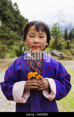 Kingdom of Bhutan, Bhutanese girl in national costume, Stock Photo