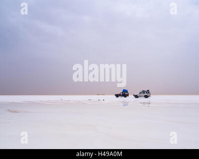 Tourists visiting salt desert and lake in the Afar Region, Danakil Depression, Ethiopia. Stock Photo