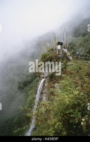 Bhutan, Trashigang, mountain, waterfall, reliquary, 'Chorte', prayer flags, wood, fog, Asia, the Himalayas, kingdom, mountainside, highland, waters, Ostbhutan, structure, Stupa, shrine, Tschörten, monument, monuments, religiously, historically, in Tibetan, devotion, memory, culture, religion, faith, Buddhism, prayer flag series, prayer pendants, pendants, flags, place of interest, clouds, haze, mountain wood, vegetation, nobody, loneliness, outside, Stock Photo