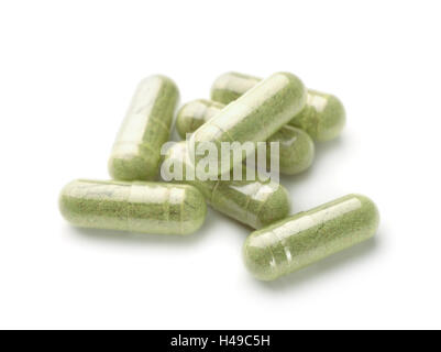 Herbal medicine capsules  isolated on white Stock Photo