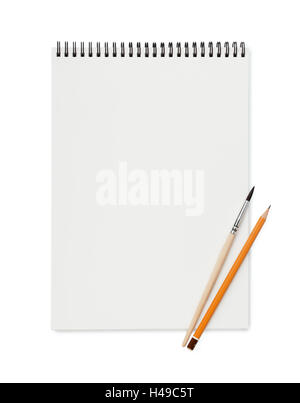 Top view of blank sketchbook with pencil and brush isolated on white Stock Photo