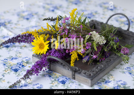 Wild flower bouquet on wooden tray, Stock Photo