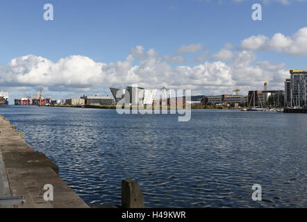 View across the Port of Belfast to The Titanic Building  in Belfast's Titanic Quarter. Stock Photo