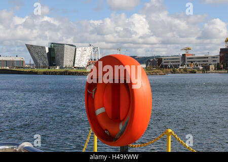 View across the Port of Belfast to The Titanic Building in Belfast's Titanic Quarter. Stock Photo