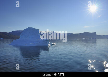 Icebergs before mountainous region, Harefjorden, Scoresbysund, Greenland, Stock Photo