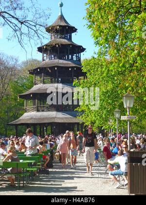 Germany, Upper Bavaria, Munich, English garden, beer garden in the Chinese tower, visitor, spring, Stock Photo