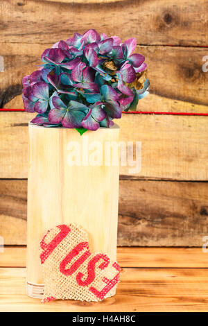 Still life with hydrangea, heart made of linen Stock Photo
