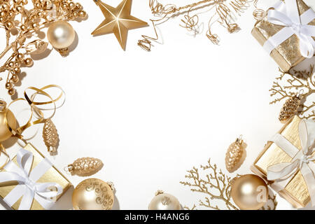 Christmas decorations on golden round tray on white wooden background ...