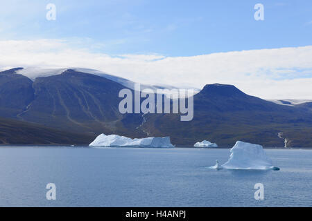 Iceberg and mountain, Harefjorden, Scoresbysund, Greenland, Stock Photo