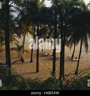 Senegal, to bass Casamance, Cap Skirring, hotel Paiotte, hotel beach, palms, bathers, evening light, Africa, West, Africa, lower Casamance, coast, beach, sandy beach, Sand, deck chairs, people, tourists, vacationers, palms, palm beach, evening, Stock Photo