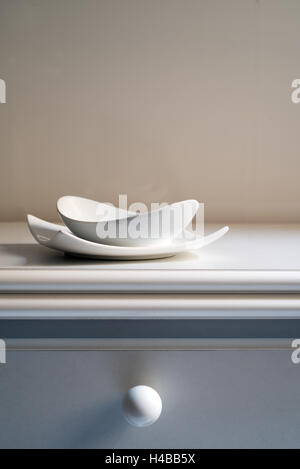 two bowls of white porcelain on a white table. copy space Stock Photo