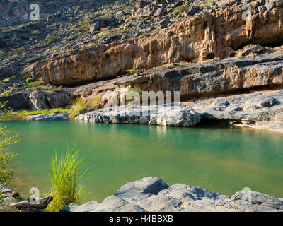 Clear water in Wadi Dam, Hajar al Gharbi Mountains, Al Dhahirah Region, Arabia, Middle East, Oman Stock Photo