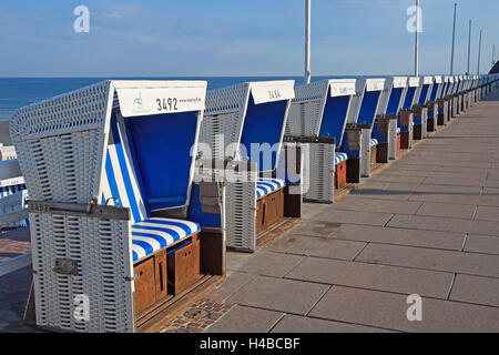 Row of beach chairs on the beach promenade of Westerland, Sylt, North Frisian Islands, North Frisia, Schleswig-Holstein, Germany Stock Photo