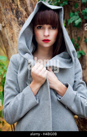 Woman in autumn coat Stock Photo