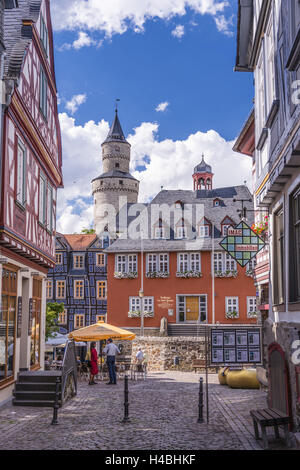 Germany, Hessen, Taunus, German Timber-Frame Road, Idstein, Obergasse with city hall and witch's tower, Stock Photo